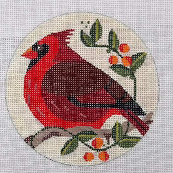 Cardinal on branch with butter yellow background
